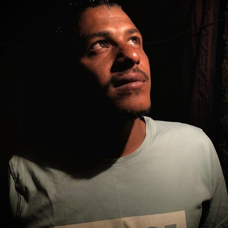 Kaveri Mehta, Lead Design Curator at Cove Paper Trail, reviewing corporate floral arrangements